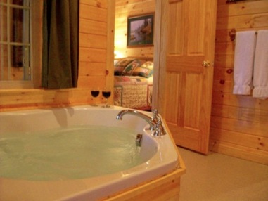 The jacuzzi at Aspen cabin at Tall Timber, Pittsburg NH
